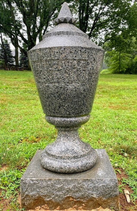 WWII Memorial Urn located next to the "Dedicated to the American Veteran" marker image. Click for full size.
