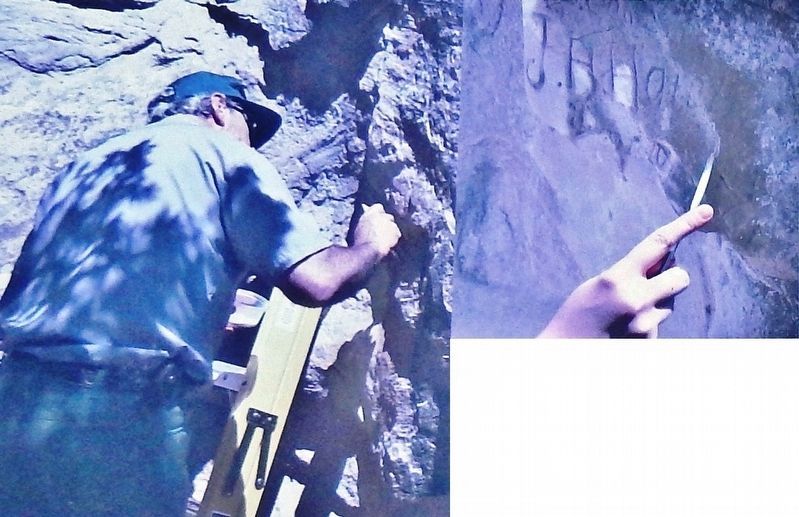 Marker detail: A National Park Service conservator uses grout to fill in cracks image. Click for full size.