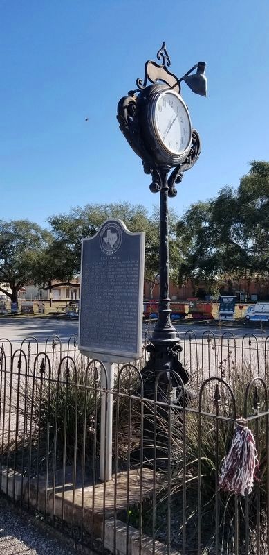 The Flatonia Marker with the nearby city clock. Click for full size. The Flatonia Marker with the nearby city clock image. Click for full size.