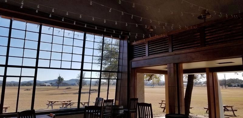The Pilots' Lounge has large windows to look out toward the golf driving range. image. Click for full size.