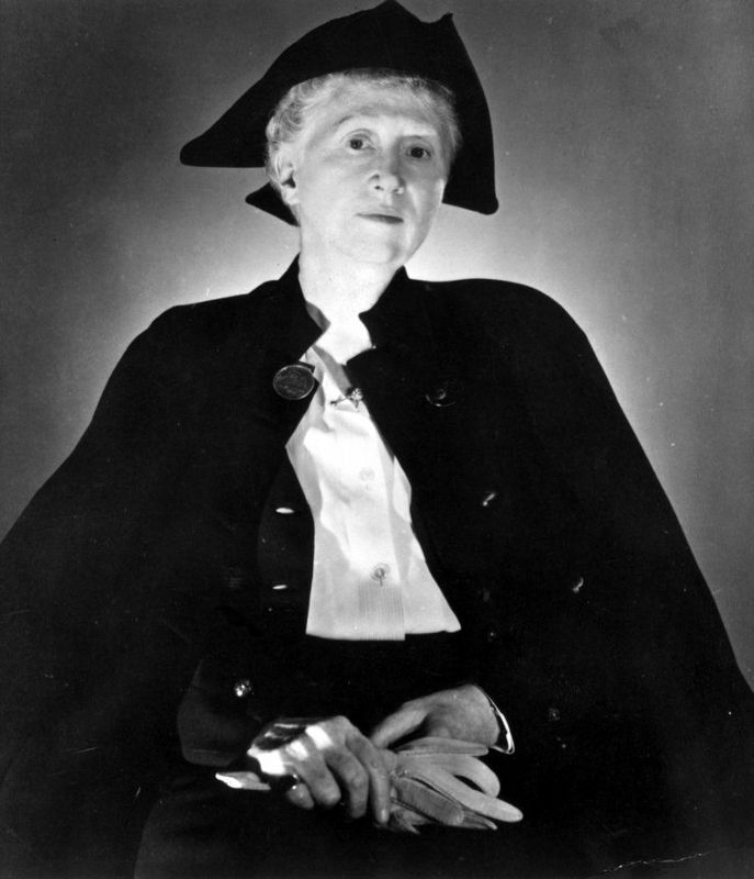 Marianne Moore, in tricorn hat and black cape image. Click for full size.