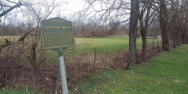 Edgington Mound Marker with the mound showing in the background. Click for full size. Edgington Mound Marker with the mound showing in the background image. Click for full size.