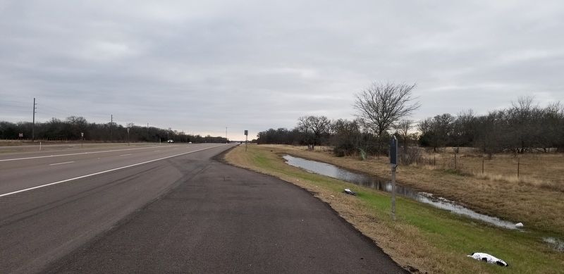 The view of the Site of Harvey Massacre Marker from the road image. Click for full size.