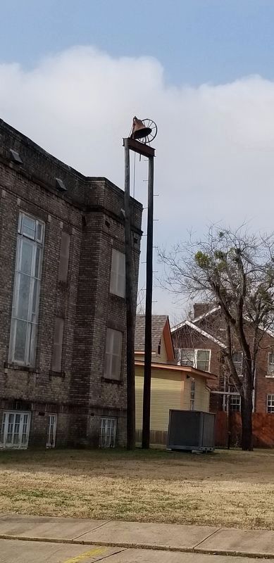 The church bell on a tall pole tower image. Click for full size.