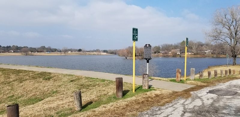 The Ivan D. Goodwin Marker is located next to the hiking trail by the lake image. Click for full size.