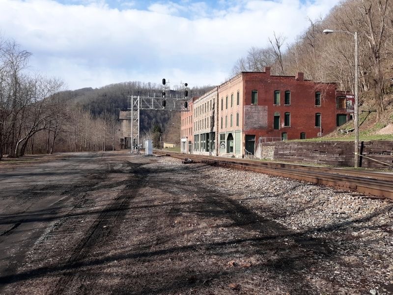Railroad tracks leading into the town image. Click for full size.