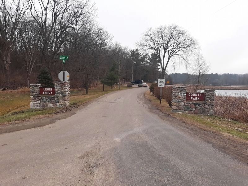 Park entrance. Marker is next to picnic area on left background. image. Click for full size.