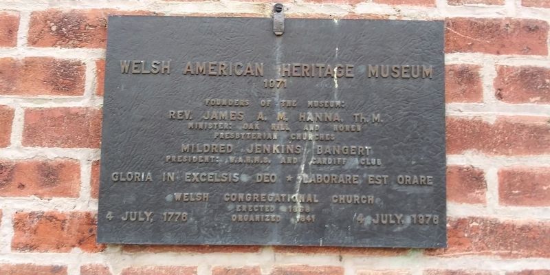 Sign on the church building image. Click for full size.