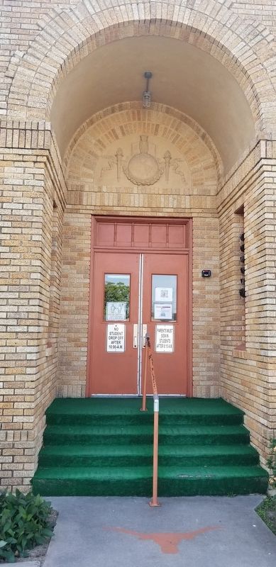 Doorway of Buell School with relief work over the entry image. Click for full size.