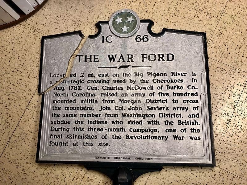 The War Ford Marker broken after being knocked down. image. Click for full size.