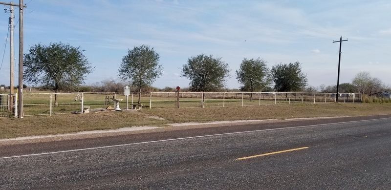 The view of the El Encino del Poso Marker from the road image. Click for full size.