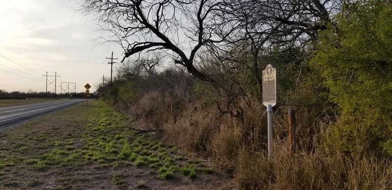 The view of the Site of Los Olmos Marker from the road image. Click for full size.