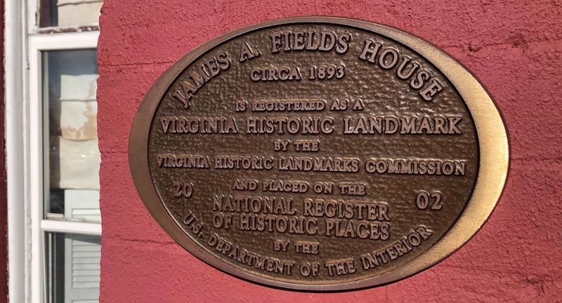 Plaque on the house image. Click for full size.