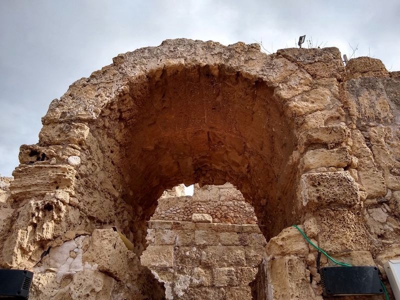 Arch Entrance to the oldest surviving Roman theater in the eastern Mediterranean. image. Click for full size.