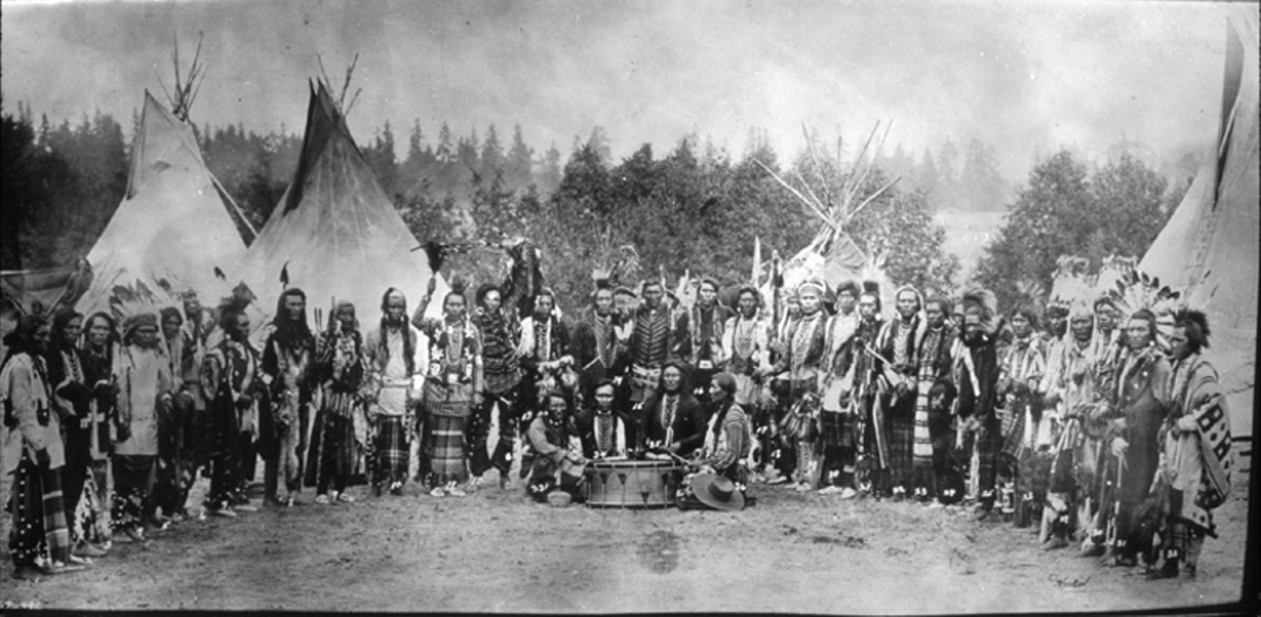 Salish men dressed in ceremonial attire-1905 image. Click for full size.