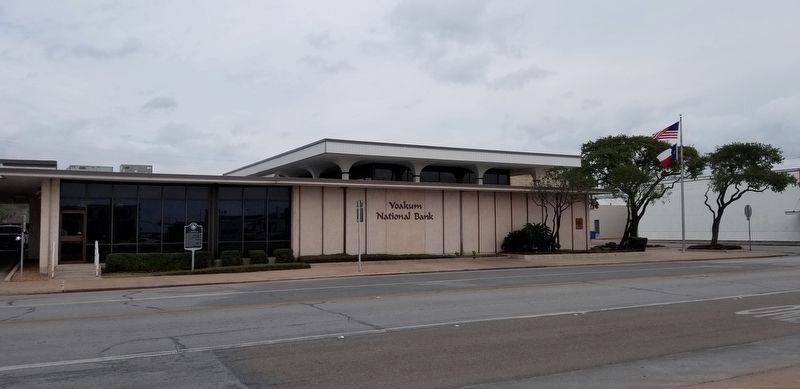 The view of the Yoakum National Bank and Marker from the road image. Click for full size.