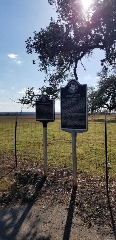 The Cibolo Crossing on the Gonzales Road Marker is the marker on the right of the two markers.. Click for full size. The Cibolo Crossing on the Gonzales Road Marker is the marker on the right of the two markers. image. Click for full size.