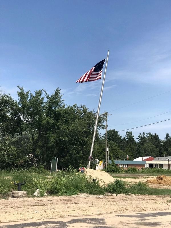 The Marker and a nearby Flag Pole image. Click for full size.