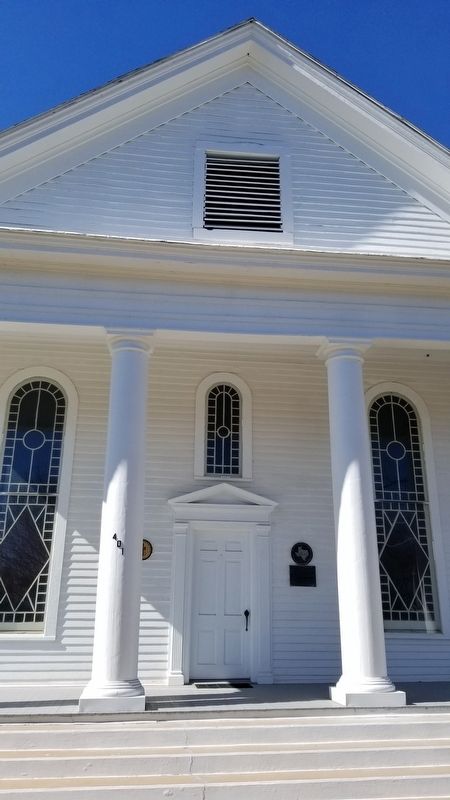 The front entrance to the First Presbyterian Church with the marker image. Click for full size.