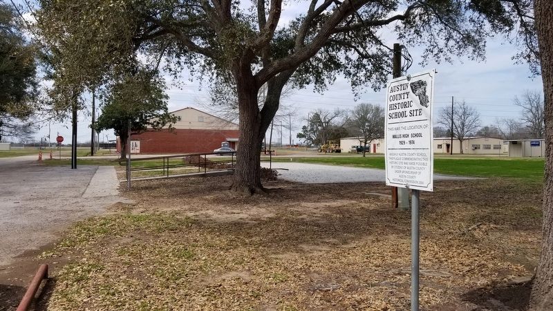 The view of the Wallis High School Marker from the road image. Click for full size.