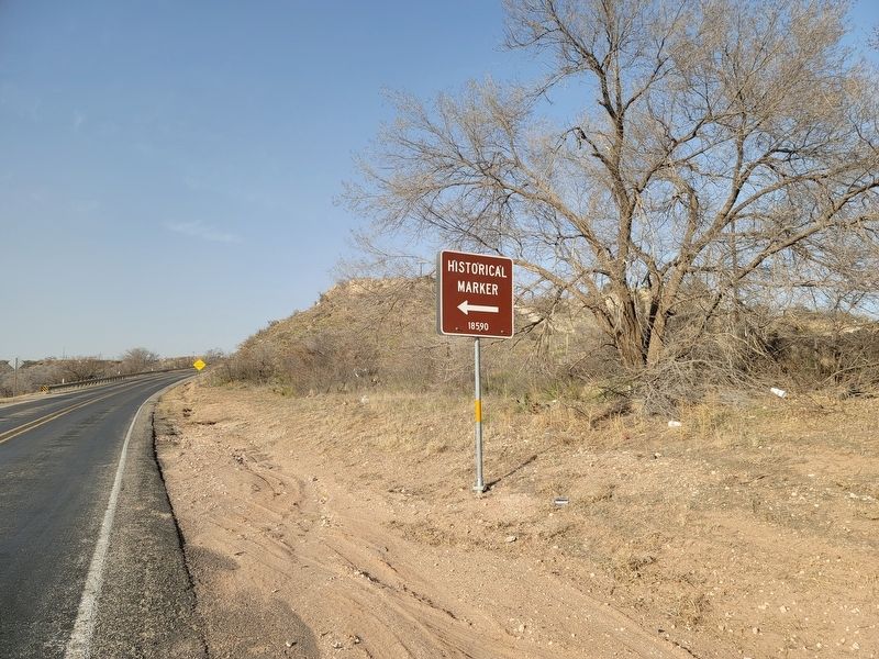 Sign pointing to the V-8 Ranch Marker image. Click for full size.