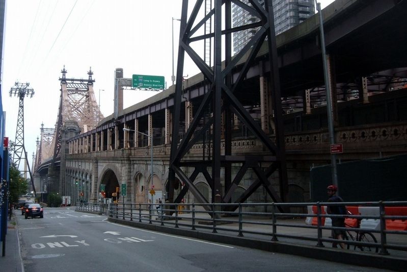 Queensboro Bridge, East 60th Street side with the Roosevelt Island Tramway tower. image. Click for full size.