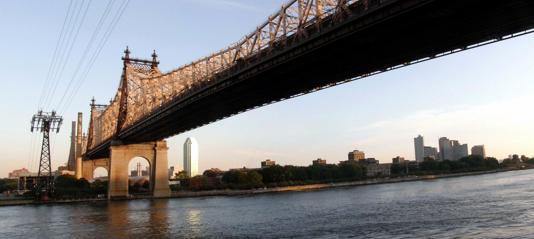 Queensboro Bridge, across the East River and over Roosevelt Island. Click for full size. Queensboro Bridge, across the East River and over Roosevelt Island image. Click for full size.