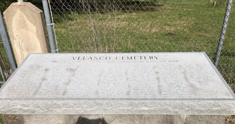 An additional stone tablet to the right of the cemetery gate image. Click for full size.