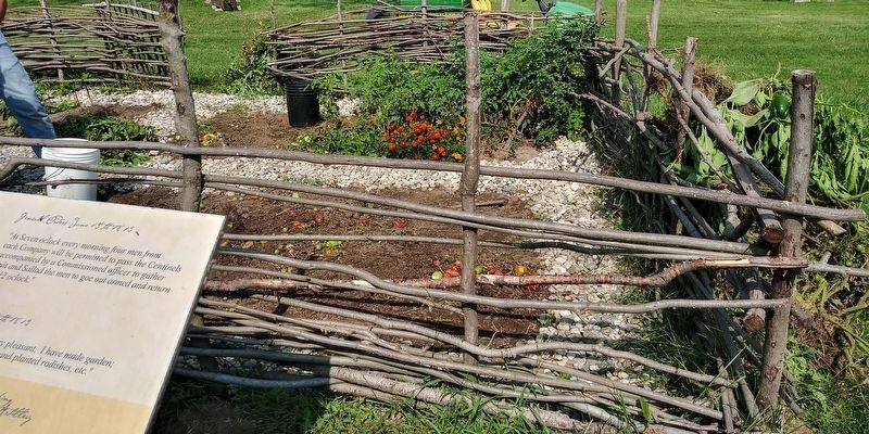 Just behind the marker is a demonstration garden similar to one that would have been at the fort image. Click for full size.