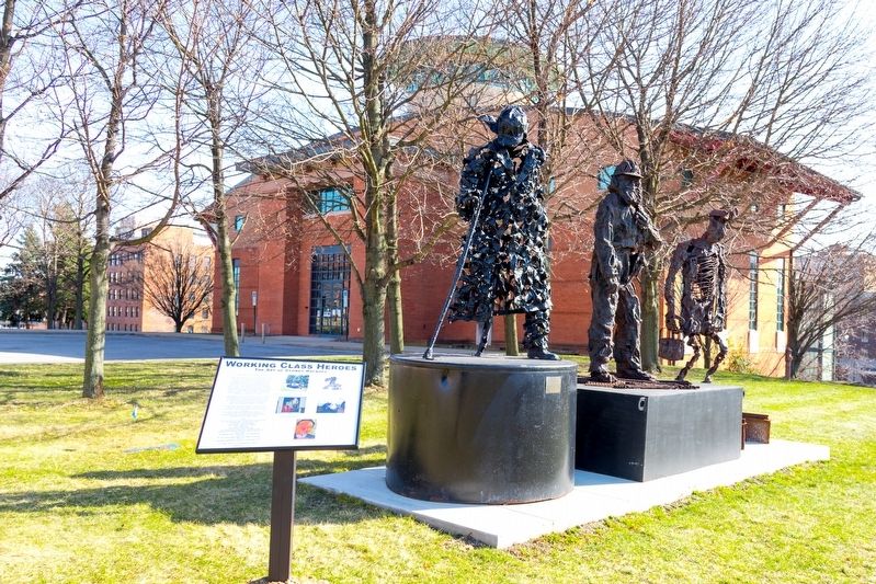Interpretive Panel and the three sculptures image. Click for full size.