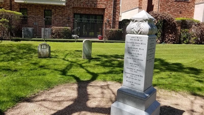Two of the last gravestones at the Morse-Bragg Cemetery and a new monument with a listing of burials image. Click for full size.