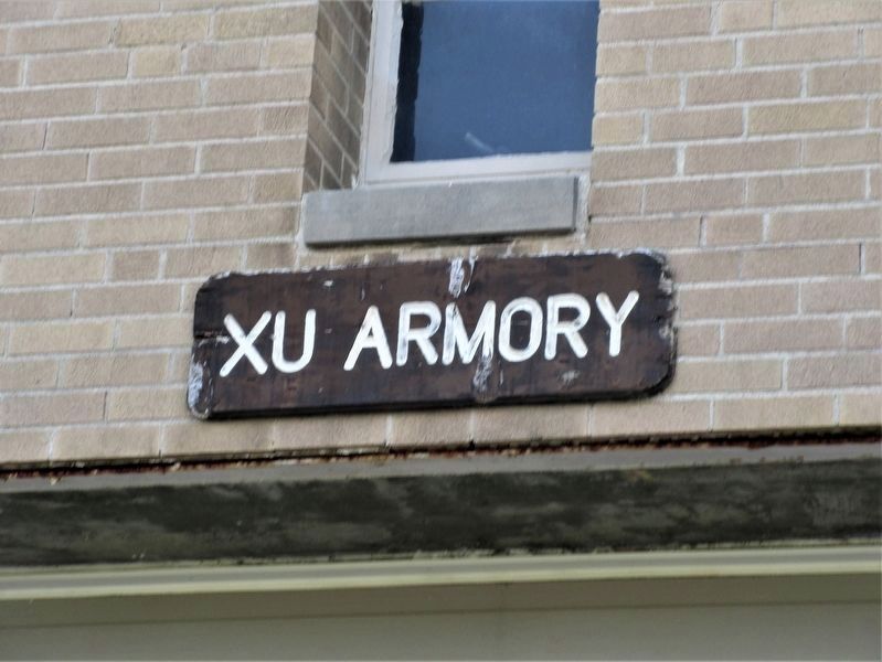 Sign above the Armory door image. Click for full size.