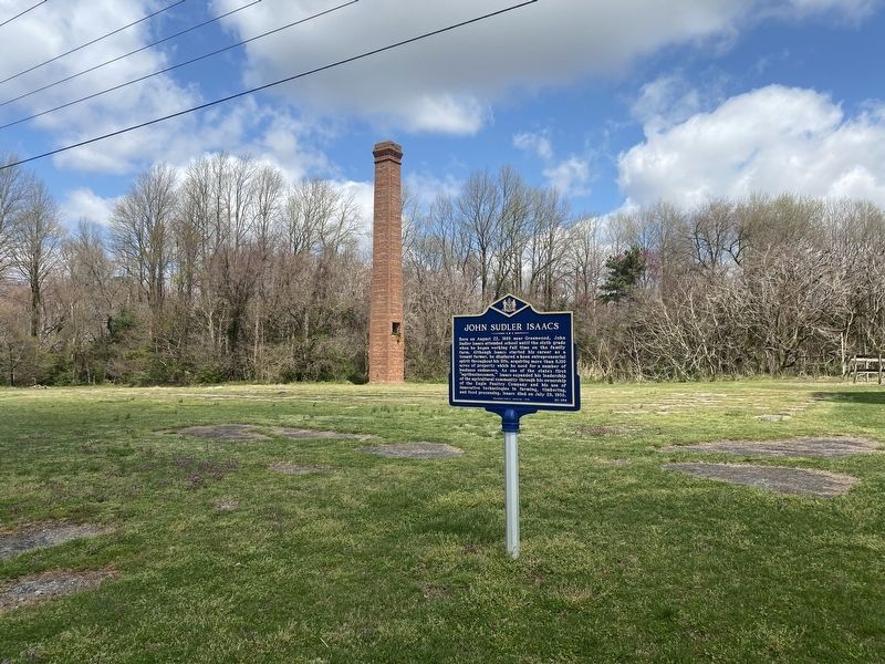 Site of the John S. Isaacs Bean Cannery. The chimney is all that remains of the original building. image. Click for full size.