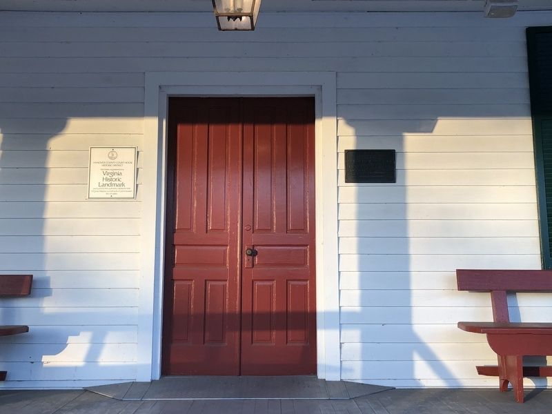 The Virginia Historic Landmark and Historic American Buildings Survey plaques hang near the door. image. Click for full size.