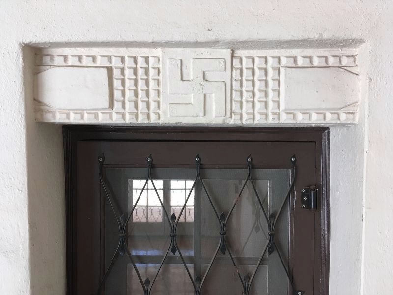 Ranch House Doorway with swastika image. Click for full size.