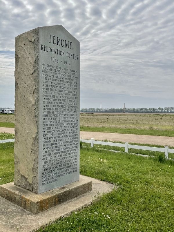 Remaining smokestack can be seen in far background right of center. image. Click for full size.