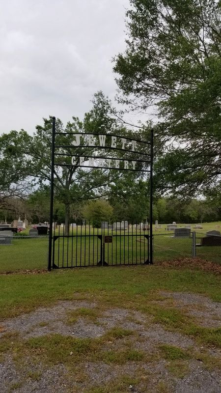 The view of the Manaen Turnbull Smith Marker through the front gate image. Click for full size.