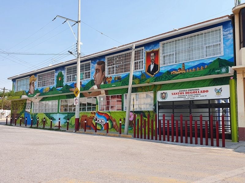 A nearby mural on the Santos Degollado School image. Click for full size.