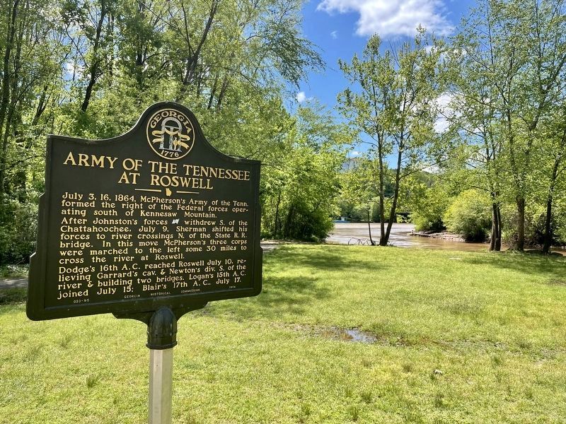 Marker with rain-swollen Big Creek flowing into the Chattahoochee River in background. image. Click for full size.