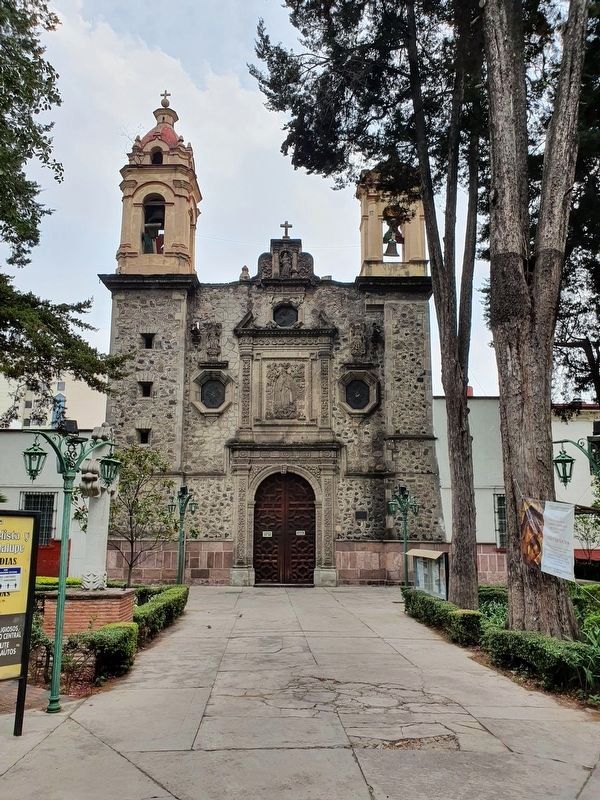 The Parish of San Juan Evangelista y Nuestra Señora de Guadalupe, across the street. Click for full size. The Parish of San Juan Evangelista y Nuestra Señora de Guadalupe, across the street image. Click for full size.
