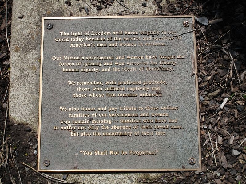 Right plaque. "The light...". Click for full size. Right plaque. "The light..." image. Click for full size.
