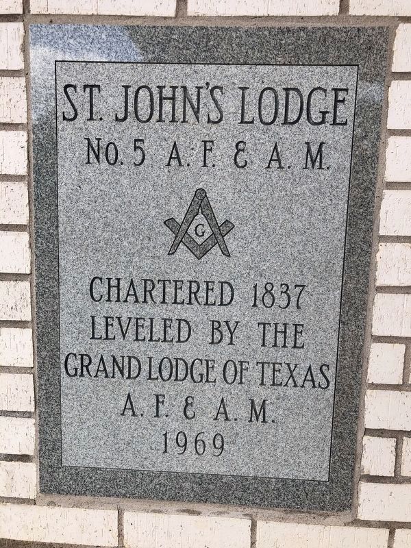 St. John's Lodge cornerstone embedded in a brick wall near the front door image. Click for full size.