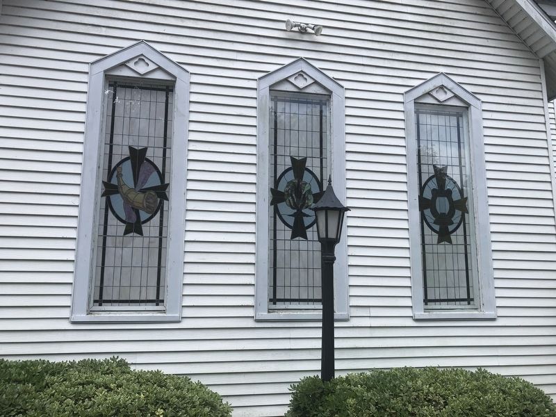 Bethel Presbyterian Church stained glass panels to the left of the front door image. Click for full size.