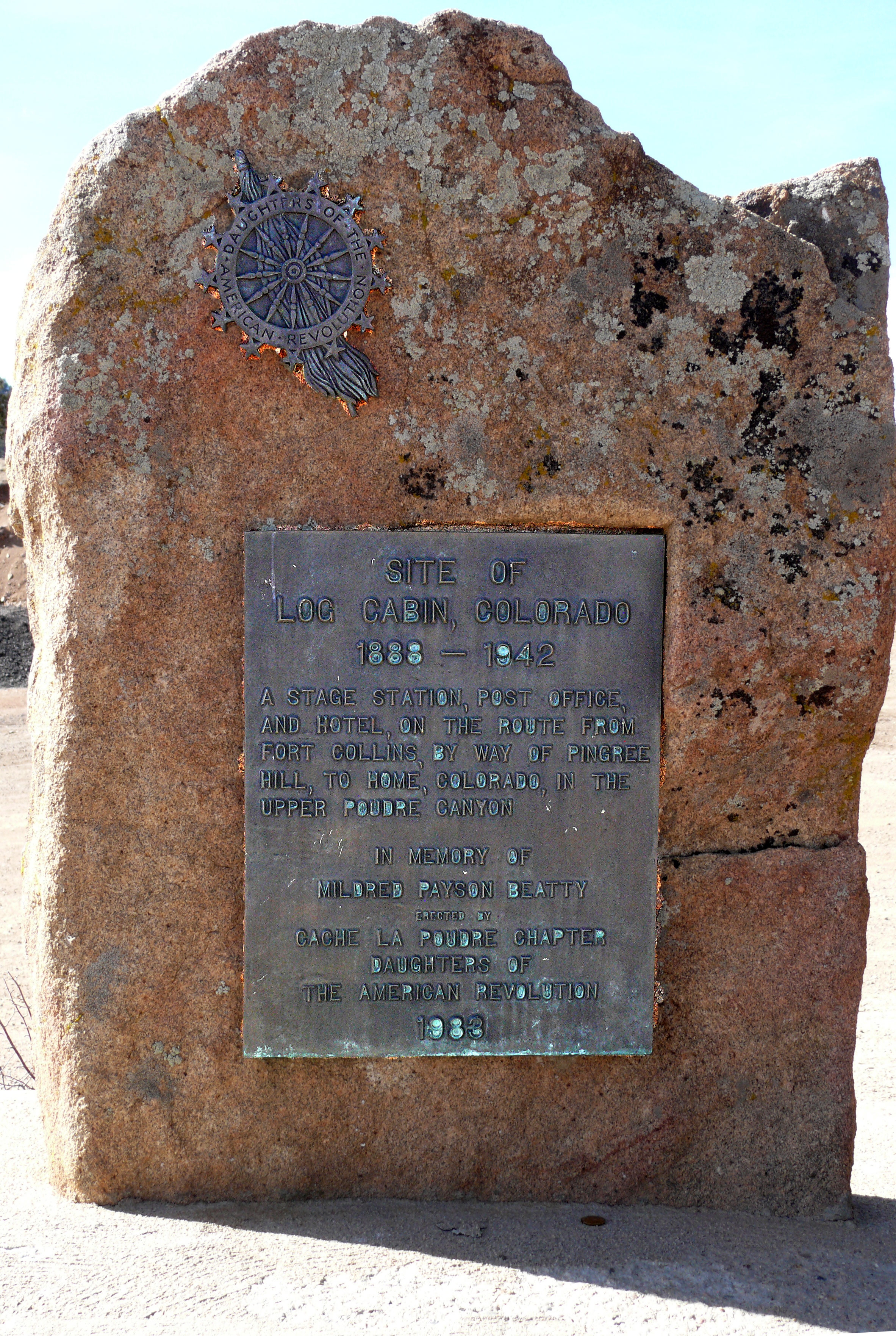 Log Cabin, Colorado Marker, as mounted on local stone.