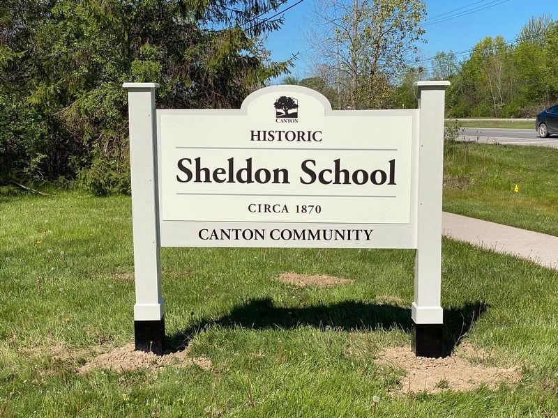 Sign at entrance to school seen from US 12 noted on marker. image. Click for full size.