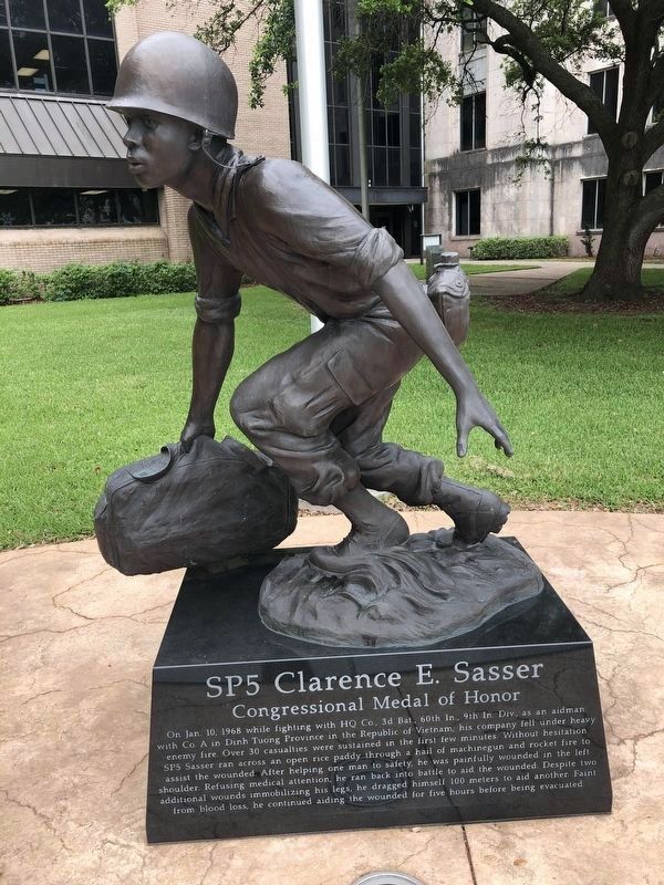 SP5 Clarence E. Sasser statue<br>Congressional Medal of Honor image. Click for full size.