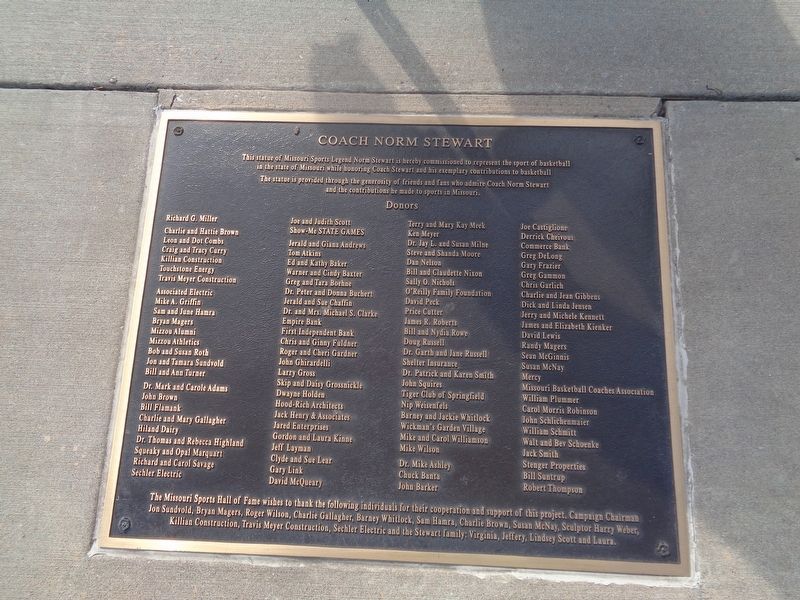 Plaque behind Norm Stewart statue image. Click for full size.