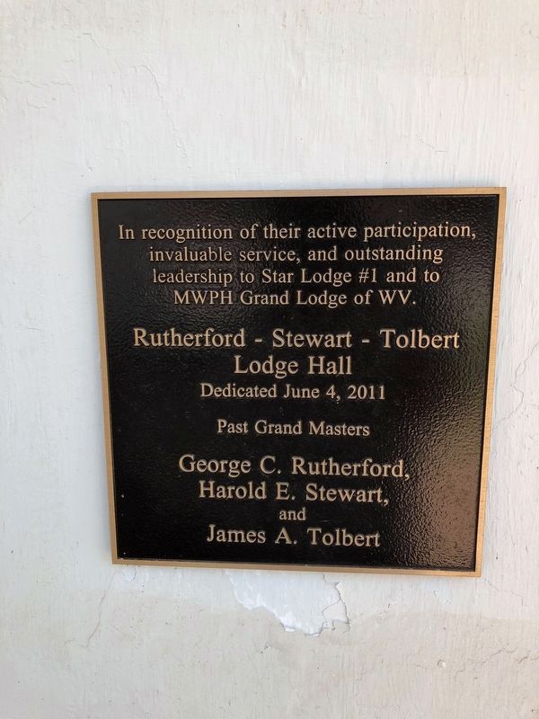Dedication plaque on the lodge building image. Click for full size.