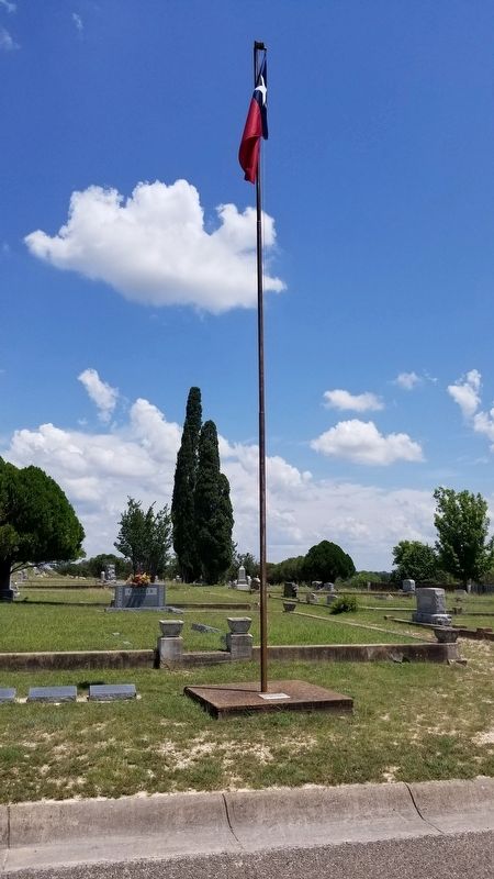 The American Legion Auxiliary Memorial next to the flag pole image. Click for full size.
