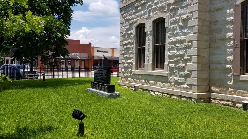 The view of the Lampasas County Veterans Memorial from the front of the courthouse. image. Click for full size.